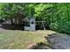 A backyard playground includes a slide, swings, and a climbing structure at 7920 Tintern Trce, Duluth, GA 30097