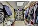Well-organized walk-in closet featuring ample storage and neatly arranged clothing at 7920 Tintern Trce, Duluth, GA 30097