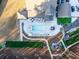 Stunning aerial view showcasing the pool, patio, and manicured lawn in a private backyard oasis at 149 Avalon Way, Sharpsburg, GA 30277
