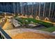 Fun backyard featuring bocce ball, horseshoes, and bowling lanes for outdoor entertainment at 149 Avalon Way, Sharpsburg, GA 30277