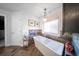 Bright bathroom showcasing a freestanding tub with stylish fixtures and tiled walls at 149 Avalon Way, Sharpsburg, GA 30277