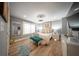Bright bedroom with large windows, a decorative bench, and modern furnishings at 149 Avalon Way, Sharpsburg, GA 30277