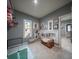 A well-appointed dog room with beds, cages, and ample space for furry friends at 149 Avalon Way, Sharpsburg, GA 30277