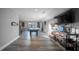 Spacious game room with a pool table, large screen TV, and wood-look floors at 149 Avalon Way, Sharpsburg, GA 30277