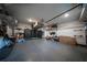 Clean and organized garage with epoxy flooring and plenty of storage space at 149 Avalon Way, Sharpsburg, GA 30277