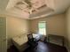 Another bedroom featuring hardwood floors and natural light, creating a cozy and inviting atmosphere at 160 Goldleaf Dr, Hampton, GA 30228