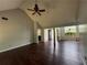 Spacious living room boasting hardwood floors, high ceilings, a ceiling fan and bright natural light at 160 Goldleaf Dr, Hampton, GA 30228