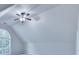 Spacious bonus room with vaulted ceiling, large window, fan, and neutral walls at 2842 Sedgeview Ln, Buford, GA 30519