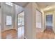 Inviting foyer with hardwood floors, showcasing the entrance, living room, and dining room at 2842 Sedgeview Ln, Buford, GA 30519