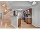 Well-equipped kitchen with stainless steel appliances, wooden cabinetry, and breakfast bar at 2842 Sedgeview Ln, Buford, GA 30519