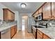 Stylish kitchen with stainless steel appliances, tile backsplash, and granite countertops at 2842 Sedgeview Ln, Buford, GA 30519