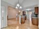 Kitchen and breakfast bar that opens to a living room featuring a fireplace and high ceilings at 2842 Sedgeview Ln, Buford, GA 30519