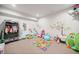 Finished basement play area perfect for , featuring colorful decor and soft carpeting at 3865 Brookhollow Dr, Douglasville, GA 30135
