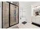 Updated bathroom featuring a tiled shower, soaking tub, and neutral colors at 3865 Brookhollow Dr, Douglasville, GA 30135
