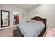 Cozy bedroom features a comfortable bed, a walk-in closet, and neutral colors at 3865 Brookhollow Dr, Douglasville, GA 30135