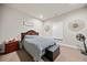 Cozy bedroom with a decorative headboard, carpeted floor, and complementary decor for a relaxing feel at 3865 Brookhollow Dr, Douglasville, GA 30135