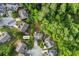 Aerial view of a home with a spacious lot in a wooded neighborhood in Grayson, GA at 414 Silver Top Dr, Grayson, GA 30017