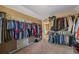 Spacious walk-in closet provides ample storage and organization, perfect for all your wardrobe needs at 414 Silver Top Dr, Grayson, GA 30017