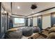 Immerse yourself in this Home Theater with cozy seating and high end projection for the best movie experience at 414 Silver Top Dr, Grayson, GA 30017