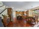 Open kitchen with wooden cabinets, stainless steel appliances, and a large island with seating at 414 Silver Top Dr, Grayson, GA 30017