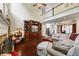 Spacious living room featuring a stone fireplace, hardwood floors and soaring ceilings at 414 Silver Top Dr, Grayson, GA 30017