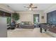 Enjoy relaxation in this living room with a foosball table and comfortable seating for entertainment at 414 Silver Top Dr, Grayson, GA 30017