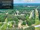Aerial view showing the home and surrounding homes with +/- 1 acre lot in Covington, GA at 1050 Kirkland Rd, Covington, GA 30016