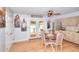 Bright and airy kitchen featuring modern appliances, a cozy dining area, and access to the patio at 1050 Kirkland Rd, Covington, GA 30016