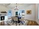 Bright dining room features a modern chandelier, sleek decor, and a conveniently located wet bar at 1102 Morley Se Ave, Atlanta, GA 30312