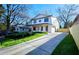 A modern, two-story home with a long driveway and well-manicured lawn at 1102 Morley Se Ave, Atlanta, GA 30312