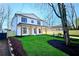 A stylish two-story home with front porch, green lawn, and attractive landscaping at 1102 Morley Se Ave, Atlanta, GA 30312