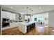Modern kitchen features a large island, stainless steel appliances, and open dining space at 1102 Morley Se Ave, Atlanta, GA 30312
