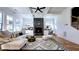 Bright living room features a modern fireplace, stylish decor, and large windows for natural light at 1102 Morley Se Ave, Atlanta, GA 30312