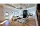 Bright living room with fireplace, large windows, and hardwood floors at 1102 Morley Se Ave, Atlanta, GA 30312