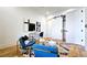 A modern office with double doors, stylish furniture, and a decorative rug at 1102 Morley Se Ave, Atlanta, GA 30312