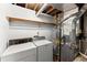 Functional laundry room with washer, dryer, and utility connections at 4949 Woodland Nw Way, Acworth, GA 30102