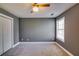 Cozy bedroom with ample closet space and natural light from the window at 6269 Colonial Vw, Fairburn, GA 30213