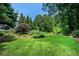 Well-maintained lawn and landscaping, enhancing the property's curb appeal and outdoor enjoyment at 265 Lee River Cv, Suwanee, GA 30024