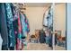 Walk-in closet with ample storage space at 265 Lee River Cv, Suwanee, GA 30024