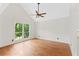 Bedroom with natural light, hardwood flooring and neutral paint creating a calming retreat at 3007 Manning Dr, Marietta, GA 30062
