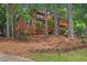 Charming two-story home with natural landscaping and a cozy, wooded setting at 3007 Manning Dr, Marietta, GA 30062