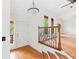 Entryway with hardwood floors, decorative railing and staircase, and natural light at 3007 Manning Dr, Marietta, GA 30062