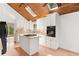 Bright kitchen featuring an island, skylights, light countertops and appliances at 3007 Manning Dr, Marietta, GA 30062