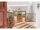 Bright living room featuring a stone fireplace and wood floors at 3007 Manning Dr, Marietta, GA 30062