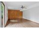 Bright living room with hardwood floors, a ceiling fan, and a sliding glass door providing access to the outside at 3007 Manning Dr, Marietta, GA 30062