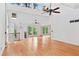 Bright and airy living area with high ceilings, wood floors, and large windows at 3007 Manning Dr, Marietta, GA 30062