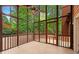 Enjoy the outdoors in this sunroom featuring an abundance of windows and a ceiling fan at 3007 Manning Dr, Marietta, GA 30062