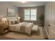 Serene bedroom with soft lighting, a plush bed, and a calming neutral color palette at 3086 Lone Oak Sw Ave, Atlanta, GA 30354