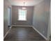 This dining room is stylish with a modern light fixture and room for a dining set at 3086 Lone Oak Sw Ave, Atlanta, GA 30354