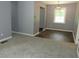 Modern dining room with hardwood floors, gray walls, and stylish light fixture at 3086 Lone Oak Sw Ave, Atlanta, GA 30354